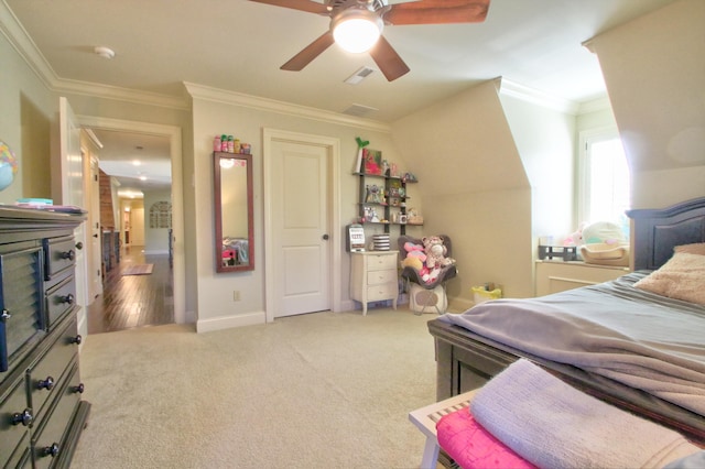 bedroom featuring visible vents, baseboards, a ceiling fan, light colored carpet, and ornamental molding