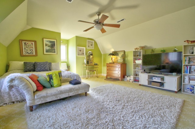 living area featuring lofted ceiling, baseboards, visible vents, and a ceiling fan