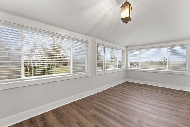 unfurnished sunroom with vaulted ceiling