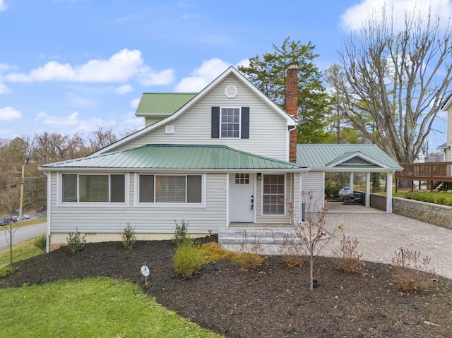 country-style home featuring a carport