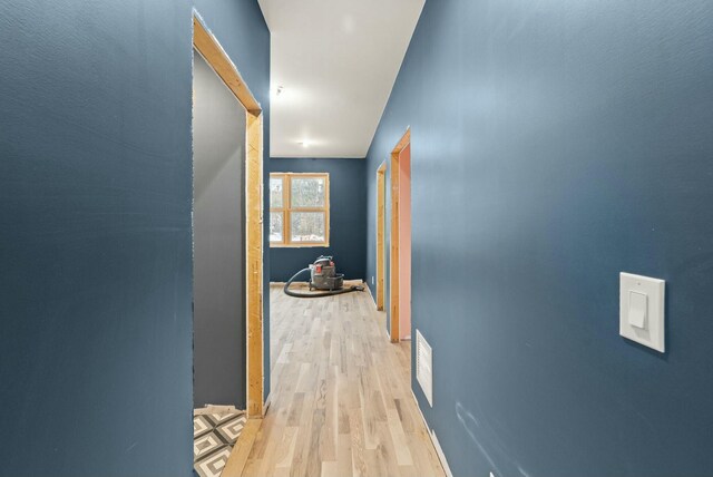 hall featuring light hardwood / wood-style floors