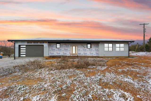 view of front of property featuring a garage