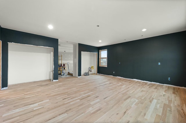 330 Duncan St, Somerset, KY 42501 - unfurnished living room with recessed lighting and light wood-type flooring