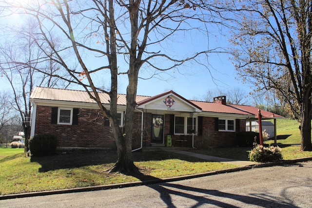 ranch-style home with a front yard