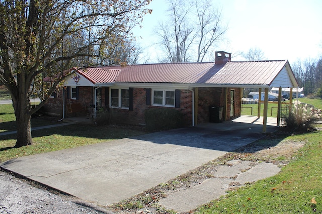 single story home with a carport and a front yard