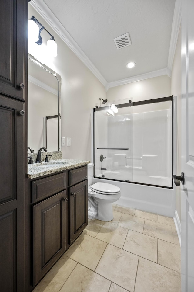 full bathroom featuring tile patterned flooring, bath / shower combo with glass door, toilet, vanity, and ornamental molding