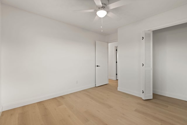 unfurnished bedroom with light wood-type flooring, a closet, and ceiling fan