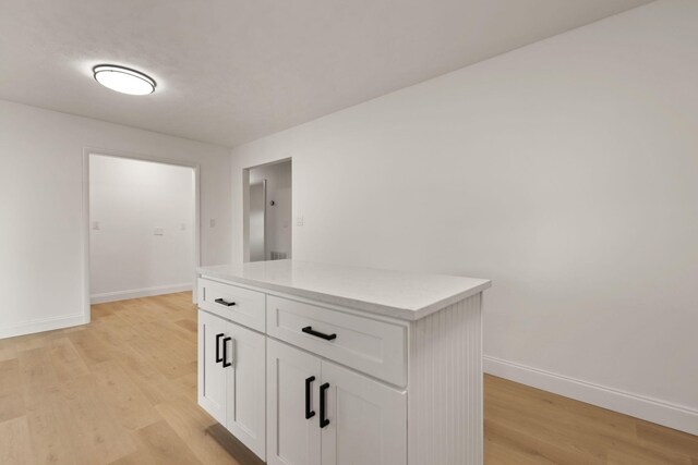 corridor featuring light hardwood / wood-style flooring