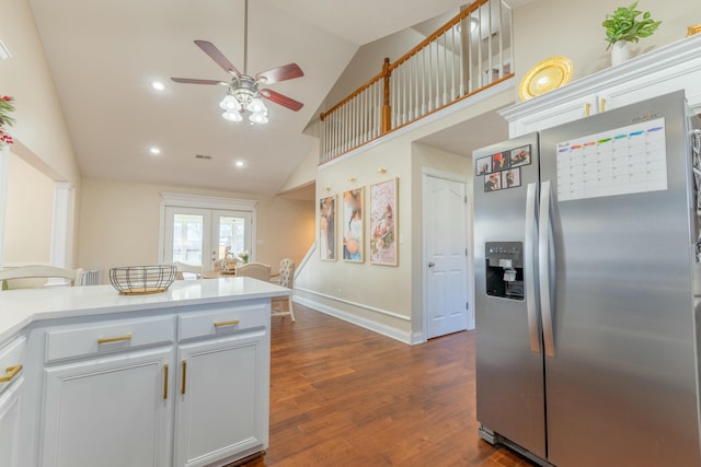 kitchen featuring ceiling fan, french doors, stainless steel fridge with ice dispenser, dark hardwood / wood-style floors, and white cabinets