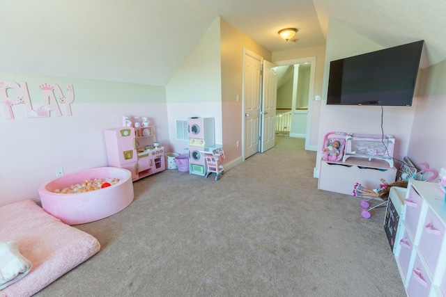 game room with light carpet and lofted ceiling