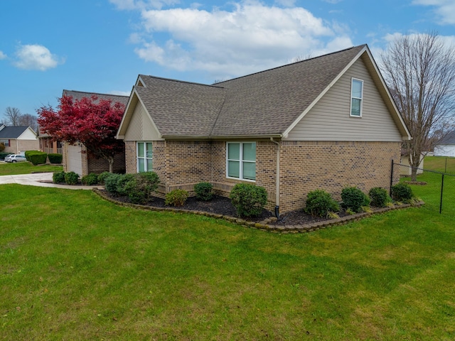 view of home's exterior featuring a yard