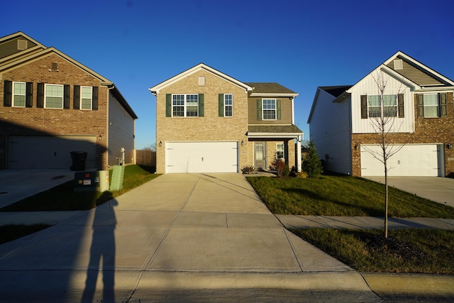 view of property with a garage and a front yard