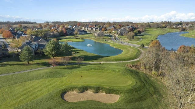 surrounding community featuring a water view