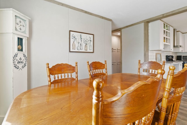 dining room featuring wood-type flooring