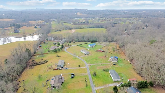 bird's eye view featuring a water view and a rural view