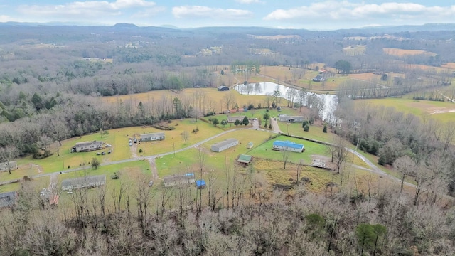 aerial view with a rural view and a water view