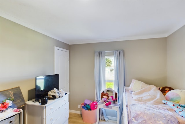 bedroom featuring light hardwood / wood-style flooring