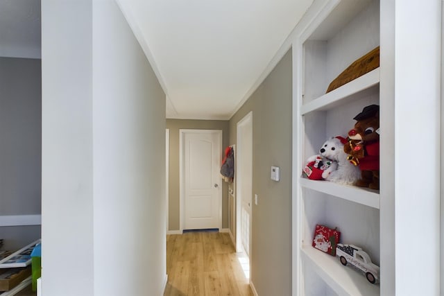 corridor with light wood-type flooring