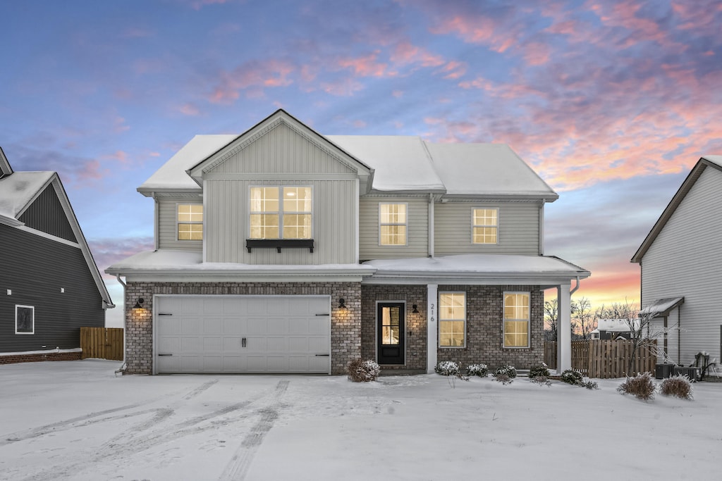 view of front of property with a garage