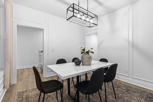 dining room featuring wood-type flooring