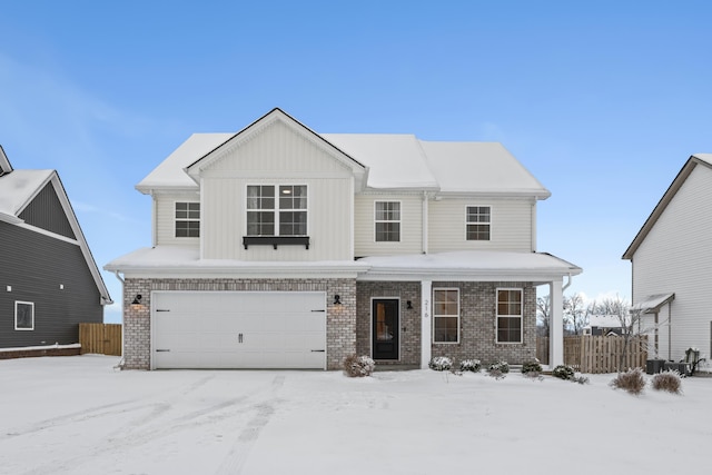 view of front of home with a garage