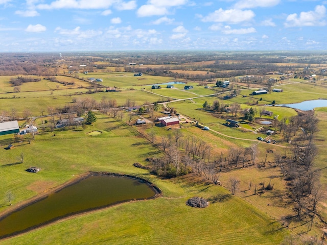 birds eye view of property with a rural view and a water view