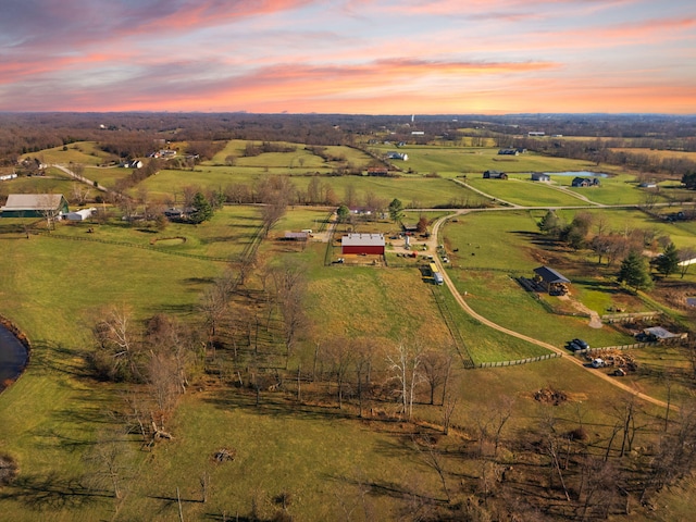 aerial view at dusk with a rural view