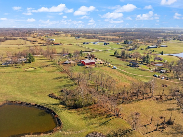 drone / aerial view featuring a rural view and a water view