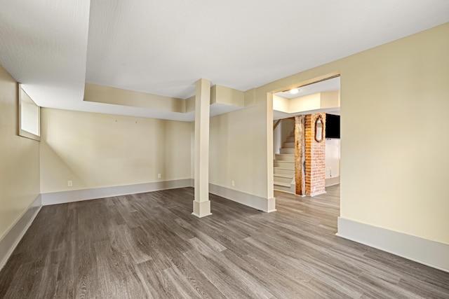 basement featuring wood-type flooring