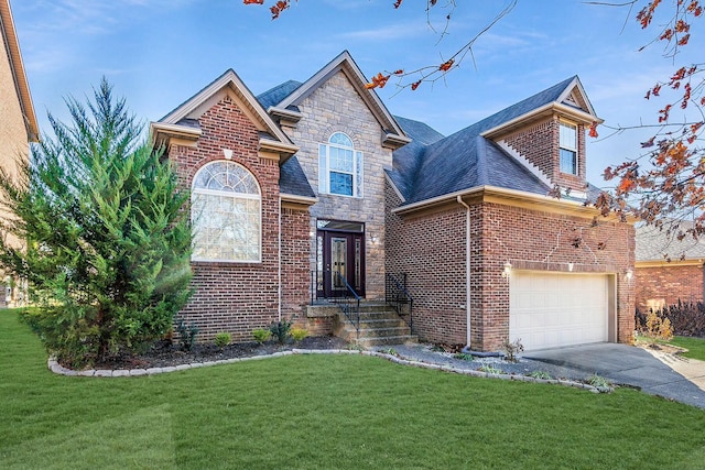 front of property featuring a front yard and a garage