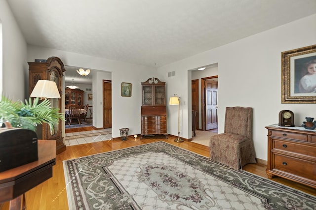 living area featuring hardwood / wood-style flooring