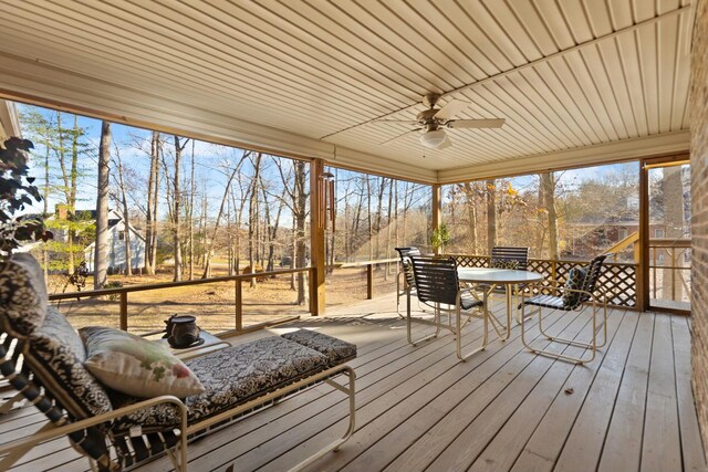 wooden terrace with ceiling fan