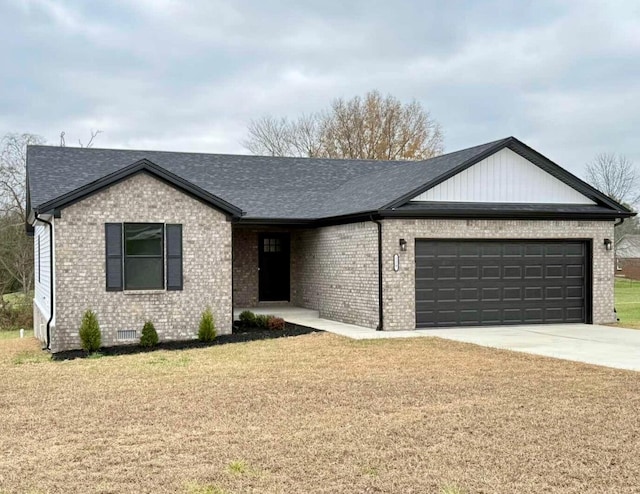 single story home with a front yard and a garage