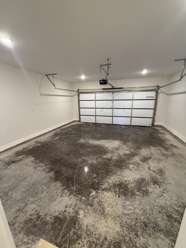 120 Lone Oak Dr, Somerset, KY 42503 - garage featuring a garage door opener and baseboards