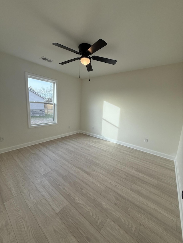 unfurnished room with light hardwood / wood-style floors and ceiling fan