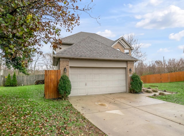 exterior space featuring a yard and a garage