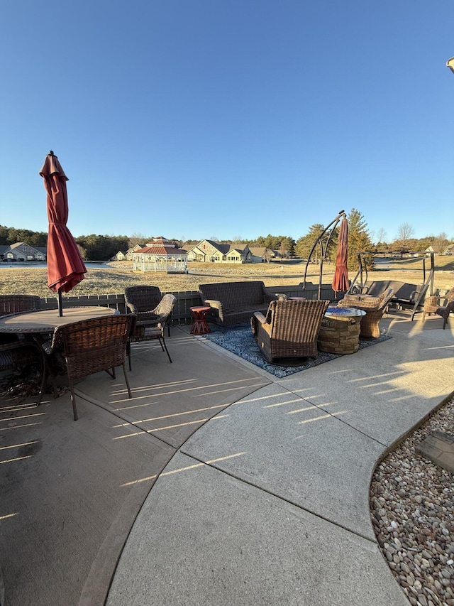 view of patio / terrace featuring a fire pit