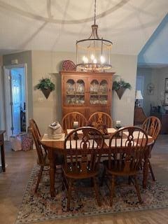 dining area featuring a chandelier