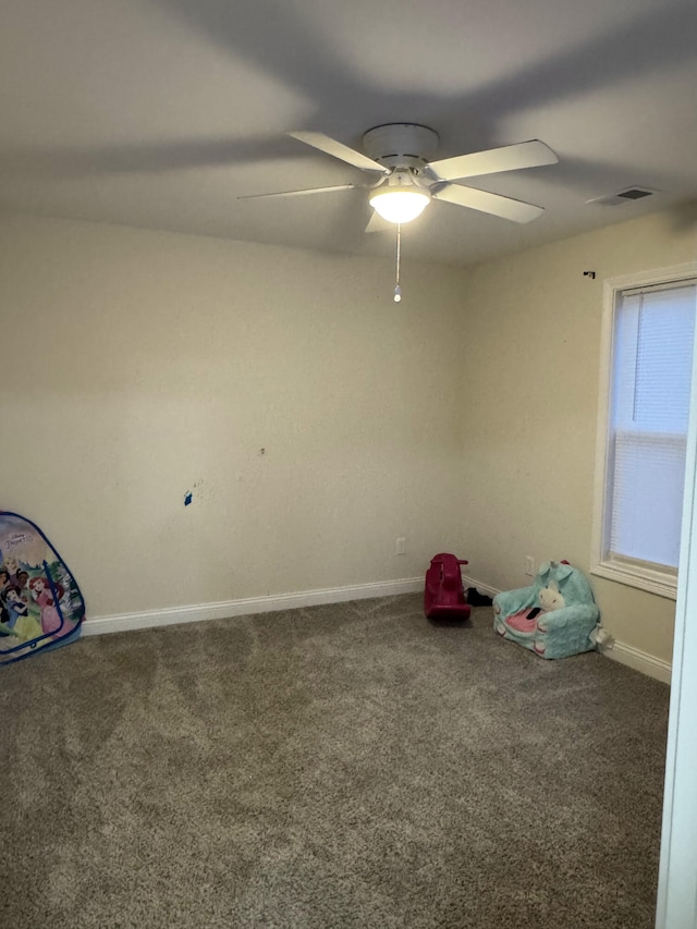 game room featuring carpet flooring and ceiling fan