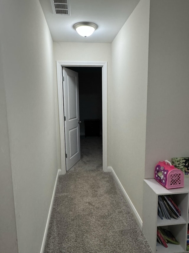 hallway with carpet