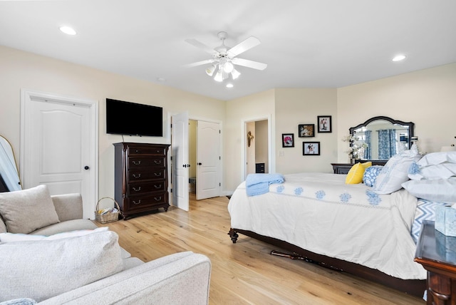 bedroom featuring light wood finished floors, recessed lighting, and ceiling fan