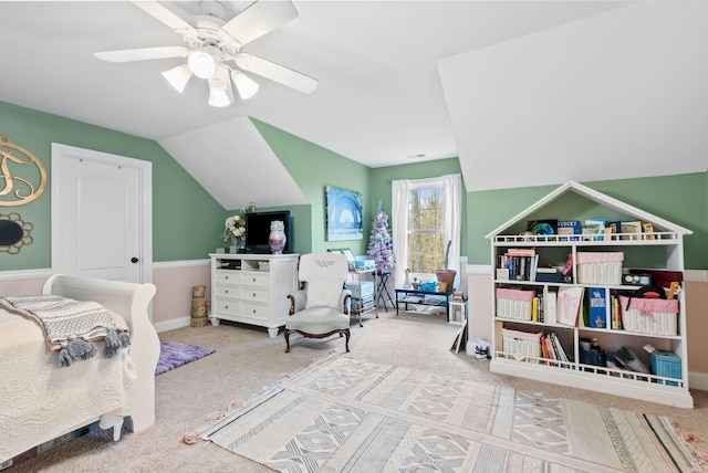 bedroom featuring carpet flooring, baseboards, ceiling fan, and vaulted ceiling