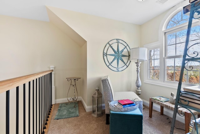 interior space with plenty of natural light, carpet flooring, and baseboards