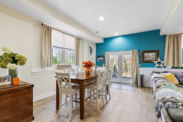 dining room with recessed lighting, french doors, baseboards, and light wood-style floors