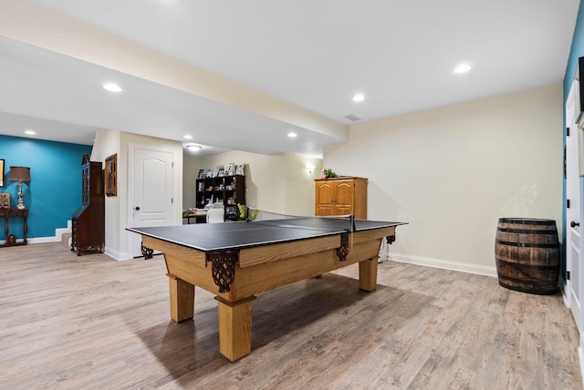 recreation room with recessed lighting, baseboards, and light wood-style floors