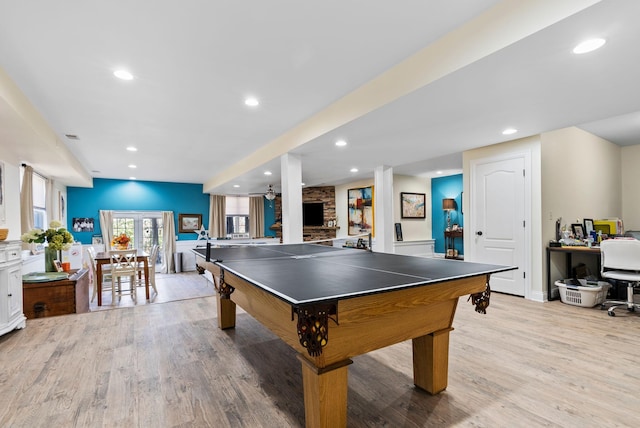 rec room featuring light wood-style flooring and recessed lighting