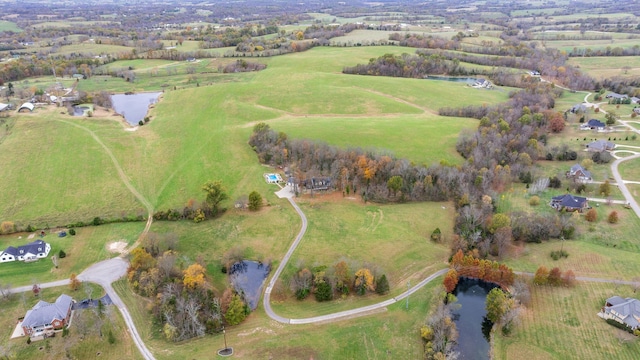 aerial view featuring a water view and a rural view