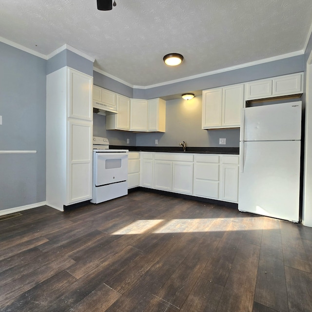 kitchen with sink, white appliances, ornamental molding, white cabinets, and dark hardwood / wood-style flooring