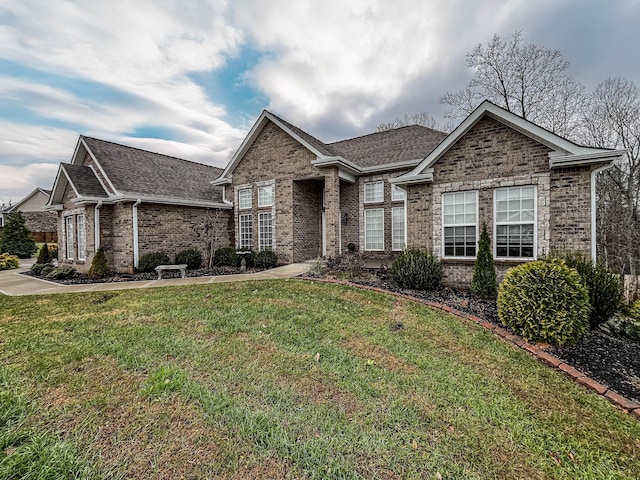 view of front of home with a front lawn