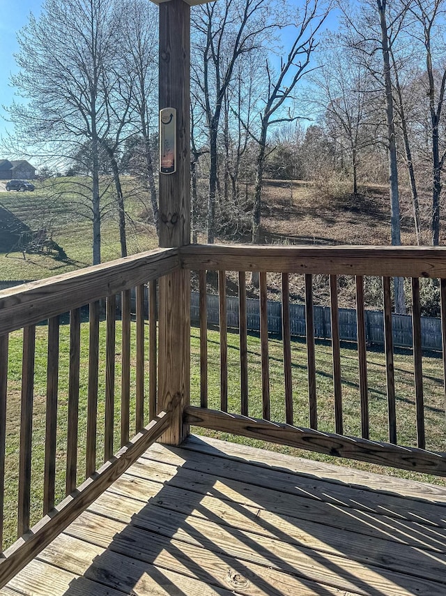 deck featuring a lawn